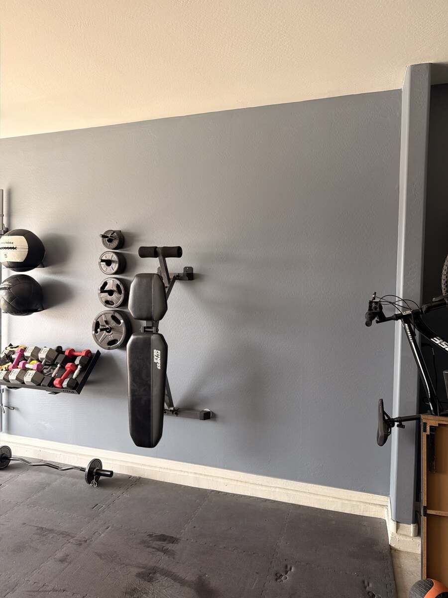 Garage gym wall before mini split installation in Litchfield Park Arizona