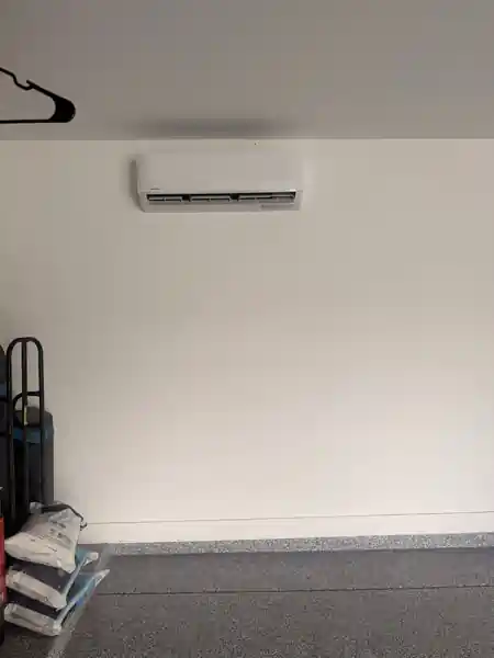 Finished garage mini split installation with attic insulation upgrade by Sapper HVAC